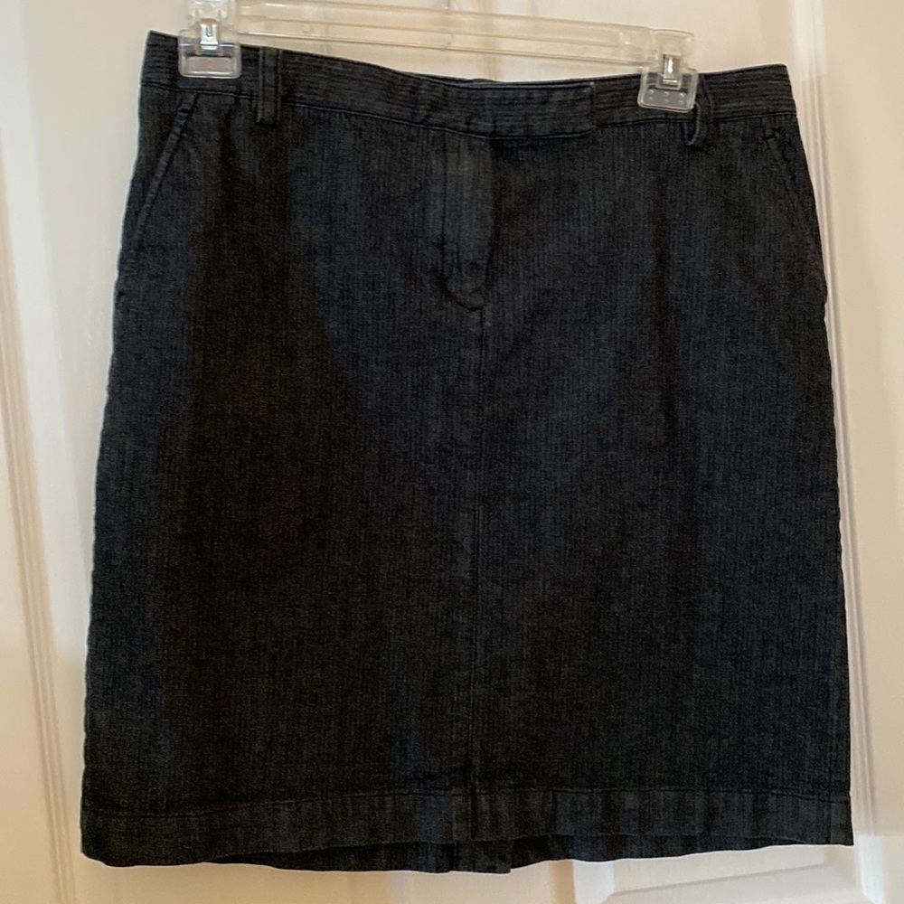 Sassy black denim skirt.